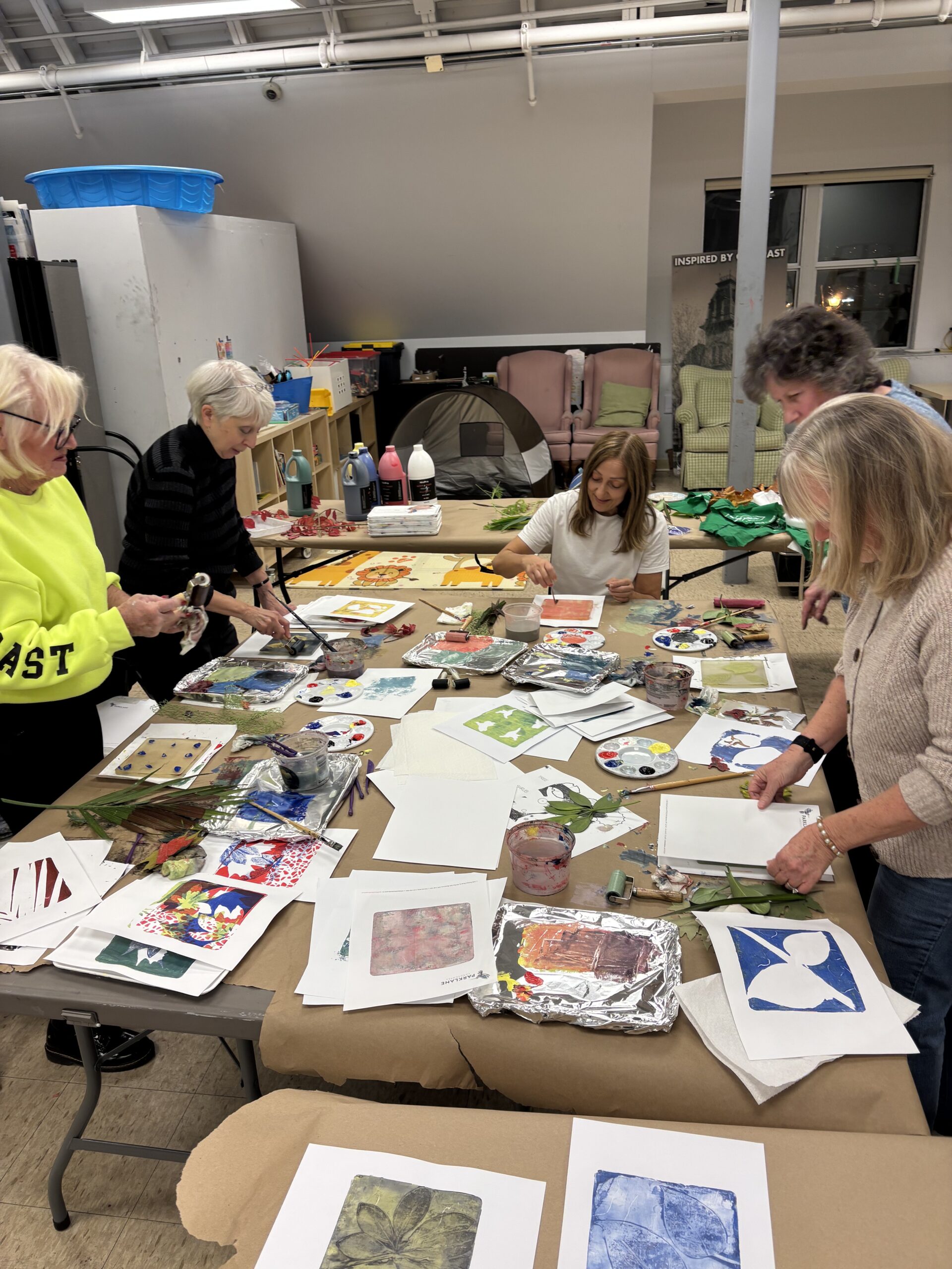 Participants creating botanical gel plate prints during a beginner printmaking workshop at the Orillia Museum of Art & History.